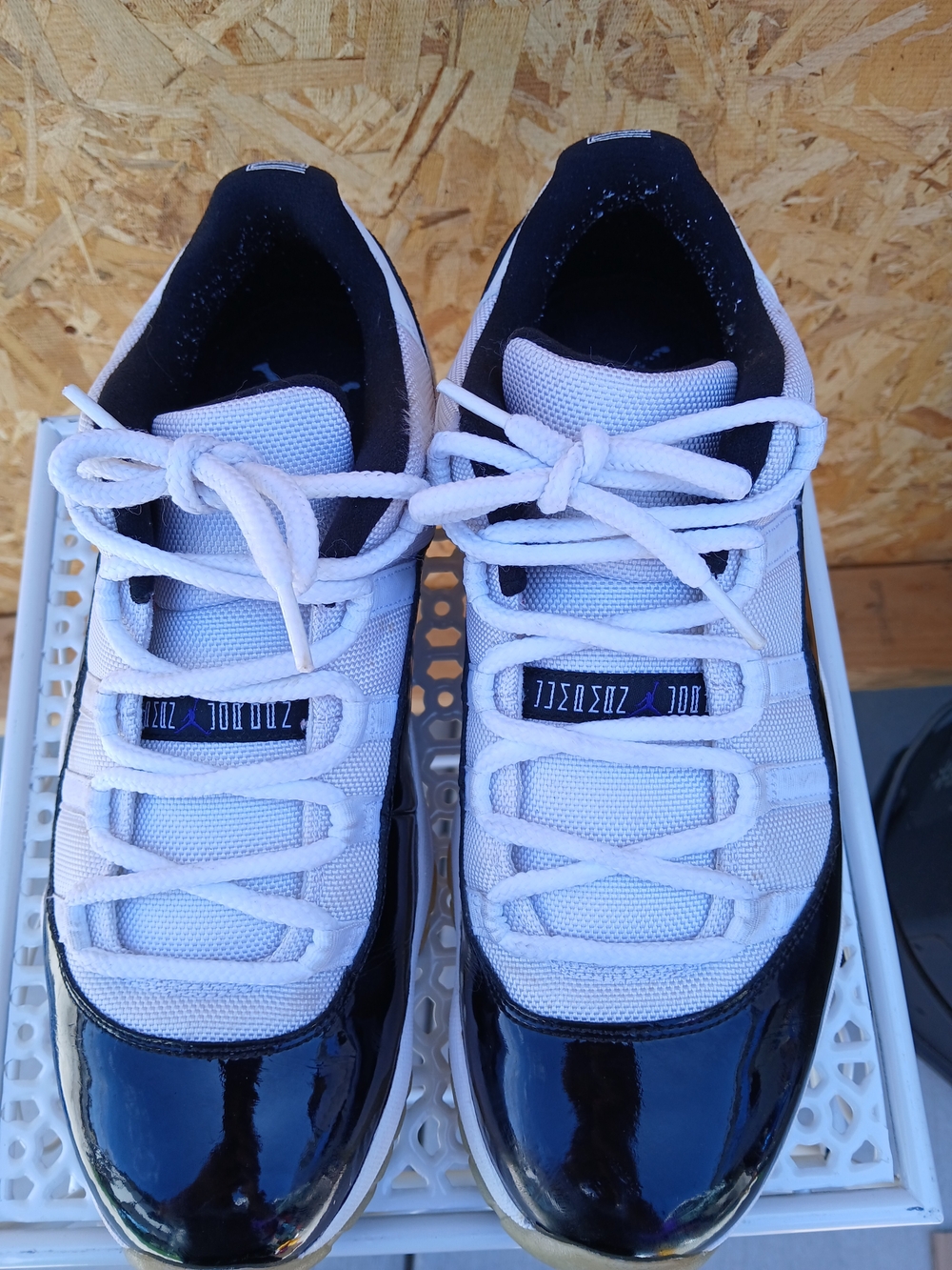 Jordan White and Black Low-Top Sneakers with Glossy Toe